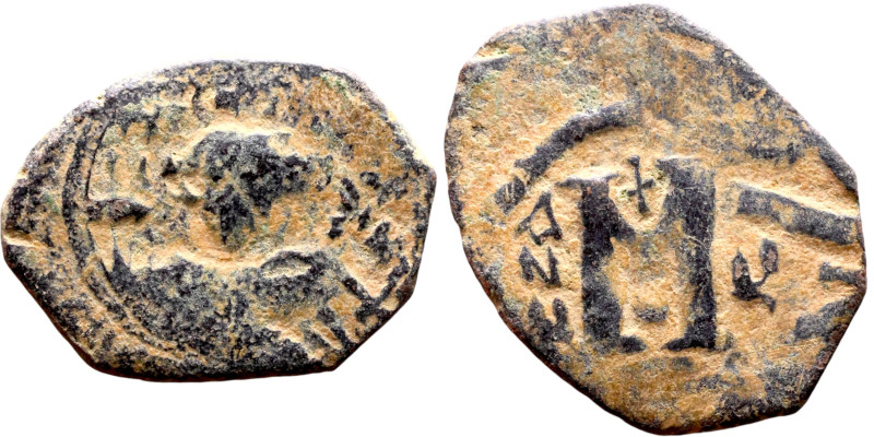 al-Malik ibn Marwan (687-705), Constans II style folis Obverse: Imperial figure ...