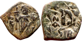 Constans II (641-668) Follis. Obverse: Imperial figure holding cross and globus Reverse: m and inscription