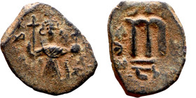 Constans II (641-668) Follis. Obverse: Imperial figure holding cross and globus Reverse: m and inscription