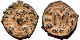 Constans II (641-668) Follis. Obverse: Imperial figure holding cross and globus Reverse: m and inscription