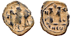 Heraclius, Martina and Heraclius Constantine (610-641) Follis Obverse: From left, Martina, Heraclius, heraclius Constantine Reverse: Large M, ANNO,