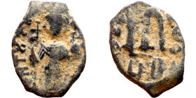 Constans II (641-668) Follis. Obverse: Imperial figure holding cross and globus Reverse: m and inscription