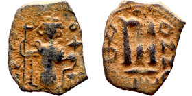 Constans II (641-668) Follis. Obverse: Imperial figure holding cross and globus Reverse: m and inscription