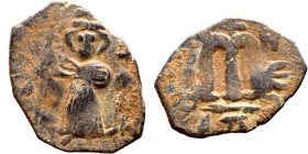 Constans II (641-668) Follis. Obverse: Imperial figure holding cross and globus Reverse: m and inscription