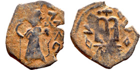 Constans II (641-668) Follis. Obverse: Imperial figure holding cross and globus Reverse: m and inscription