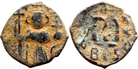 Constans II (641-668) Follis. Obverse: Imperial figure holding cross and globus Reverse: m and inscription