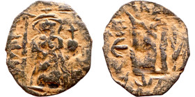 Constans II (641-668) Follis. Obverse: Imperial figure holding cross and globus Reverse: m and inscription
