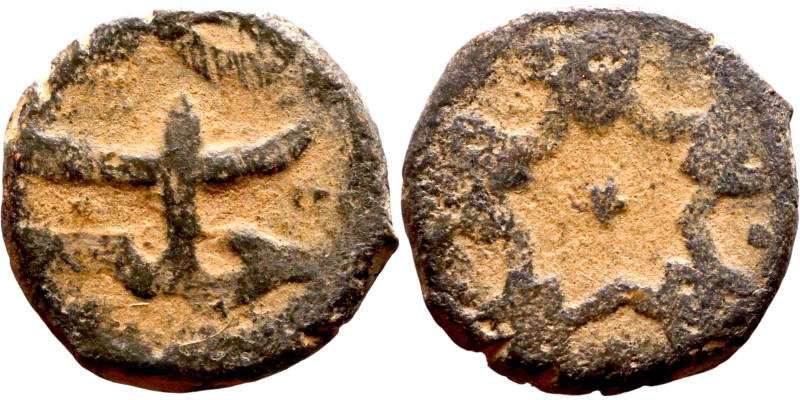 Seljuk (1037–1157, bronze coin. Obverse: Arabic inscription. Reverse: Arabicc in...