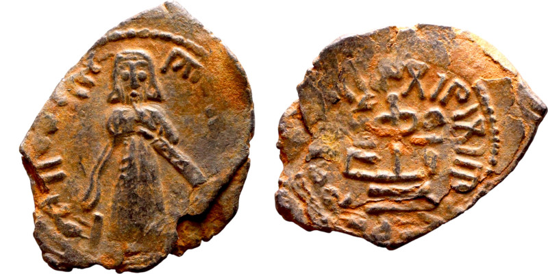 al-Malik ibn Marwan (687-705) Follis. Obverse: Imperial figure. Reverse: Modifie...