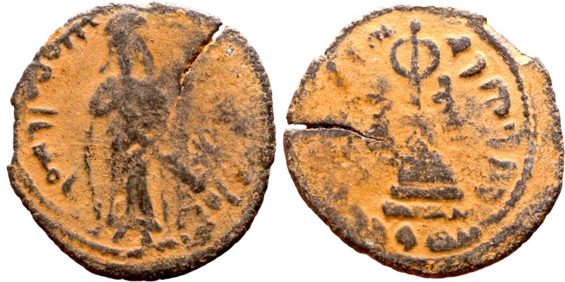 al-Malik ibn Marwan (687-705) Follis. Obverse: Imperial figure. Reverse: Modifie...