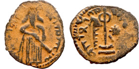 al-Malik ibn Marwan (687-705) Follis. Obverse: Imperial figure. Reverse: Modified cross potent set on steps