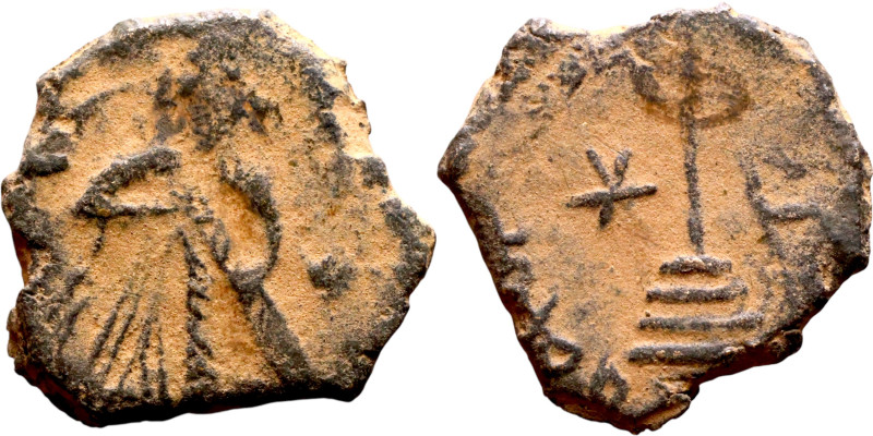 al-Malik ibn Marwan (687-705) Follis. Obverse: Imperial figure. Reverse: Modifie...