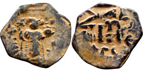 Constans II (641-668) Follis. Obverse: Imperial figure holding cross and globus Reverse: m and inscription