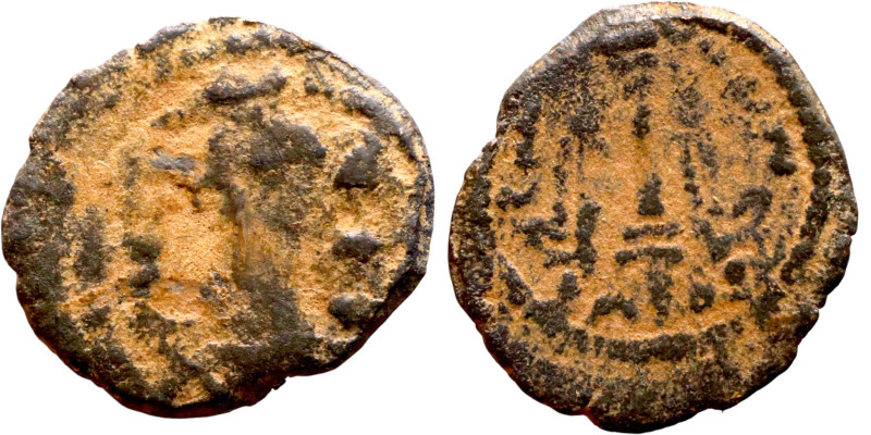 Sasanian bronze coin (V century), ObverseL Bust of King. Reverse: Fire Altar

...