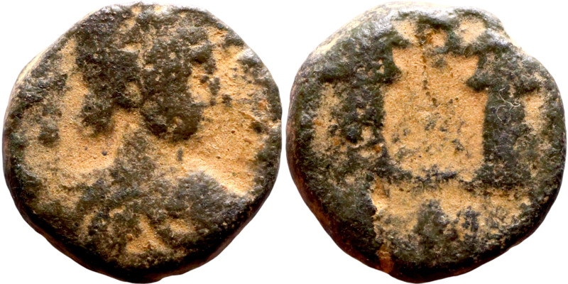Arcadius (395-408) Follis. Obv: Bust of emperor. Rev: Two victories holds wereat...
