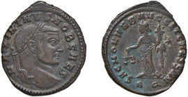 MASSIMINO II DAIA Cesare (308-313) FOLLIS 305 - Zecca Roma - D/Busto laureato a d. MAXIMINVS NOB CAES R/La dea Moneta stante a s. con la mano d. tiene...
