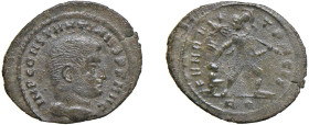 COSTANTINO I (306-337) MEZZO FOLLIS 313 - Zecca Roma - D/Busto spoglio a d. IMP CONSTANTINVS PF AVG R/Marte andante a d. rivolto indietro e tiene un t...