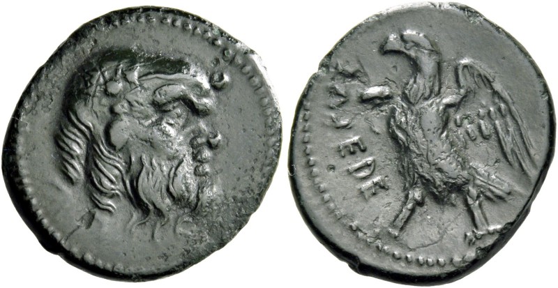 Umbria, Tuder. Bronze circa 280-240, Æ 2.96 g. Head of Silenus r. Rev. Eagle sta...