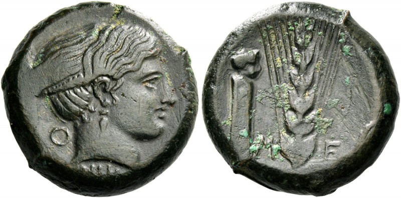 Metapontum. Bronze circa 425-350, Æ 9.39 g. Female head r . Rev. M – E Ear of ba...