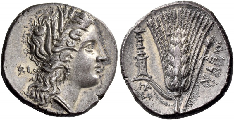 Metapontum. Nomos circa 290-280, AR 7.62 g. Head of Demeter r., wearing barley w...