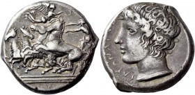 Catana. Tetradrachm signed by Heracleidas circa 405, AR 17.11 g. Fast quadriga driven l. by charioteer, holding reins in both hands; above, Nike flyin...