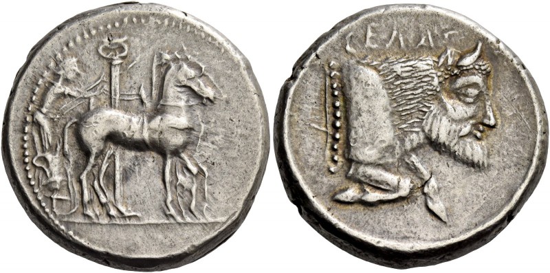 Gela. Tetradrachm circa 465-460, AR 17.18 g. Slow quadriga driven r. by chariote...
