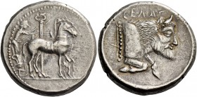 Gela. Tetradrachm circa 465-460, AR 17.18 g. Slow quadriga driven r. by charioteer holding reins and kentron; in the foreground, column. Rev. CΕΛΑΣ Fo...