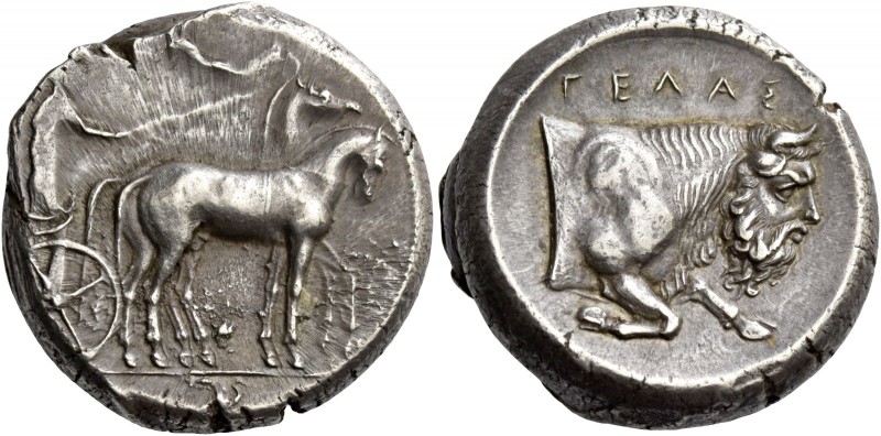 Gela. Tetradrachm 420-415, AR, 17.53 g. Slow quadriga driven r. by charioteer; a...