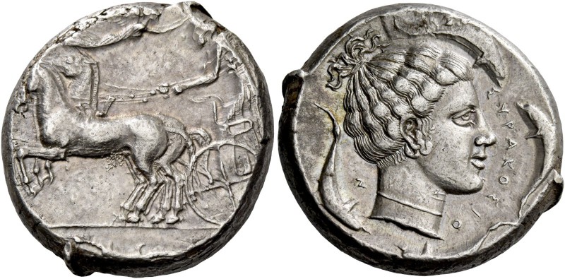 Syracuse. Tetradrachm circa 440-430, AR 17.15 g. Prancing quadriga driven l. by ...