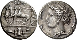 Syracuse. Decadrachm signed by Euainetos circa 400 BC, AR 43.05 g. Fast quadriga driven l. by charioteer, holding reins and kentron; in field above, N...