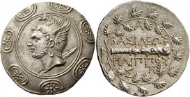 Philip V, 220 – 179. Tetradrachm, Amphipolis 188-183, AR 16.74 g. Head of young Perseus l., wearing winged griffin-headed helmet, sword on his r. shou...
