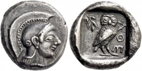 Attica, Athens. Drachm circa 500-490, AR 4.23 g. Helmeted head of Athena r., wearing earring and necklace. Rev. AΘE Owl standing r., head facing; in l...