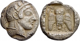 Attica, Athens. Decadrachm circa 467-465, AR 42.53 g. Head of Athena r., wearing crested helmet, earring and necklace; bowl ornamented with spiral and...