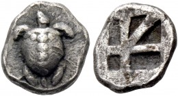 Aegina, Aegina. Obol circa 520, AR 0.98 g. Sea turtle seen from above, with thin collar and dots running down the back. Rev. Large skew pattern incuse...