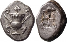 Naxos. Stater circa 520-515-490, AR 12.19 g. Cantharus with ivy leaf finial on lid; grape bunches hanging from handles. Rev. Quadripartite incuse squa...