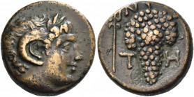 Tenos. Bronze circa 308-288, Æ 5.29 g. Head of Apollo Carneius r. Rev. N – I / T – H Bunch of grapes; in l. field, trident. BMC 9. SNG Copenhagen 775....
