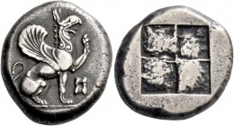 Teos. Stater circa 460, AR 11.67 g. Griffin seated r., with l. forepaw raised; below, astragalos. Rev. Quadripartite incuse square. Weber 6205 (this c...