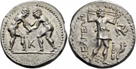 Selge. Stater circa 325-250, AR 8.51 g. Two wrestlers grappling; in lower middle field, K. Rev. ΣEΛΓEΩN Slinger standing r.; in r. field, triskeles on...