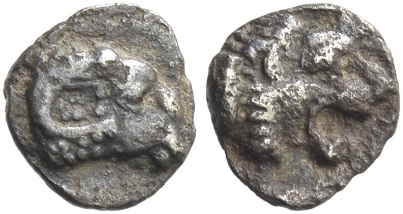 Abdemon, before 411. 1/24 siglos before 411, AR 0.21 g. Head of ram r. Rev. Head...