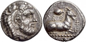 Evagoras I, 411 – 373. Siglos circa 411-373, AR 10.96 g. e u va ko ro in Cypriot characters. Head of Heracles r., wearing lion skin headdress. Rev. ba...