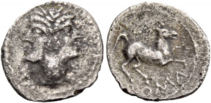 Litra, Spanish mint (?) circa 225-212, AR 0.75 g. Laureate Janiform head of Dios...