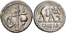 C. Iulius Caesar. Denarius, mint moving with Caesar 49-48, AR 3.80 g. Pontifical emblems: culullus, aspergillum, axe and apex. Rev. Elephant r., tramp...