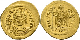 Maurice Tiberius, 582 – 602. Solidus 583-601, AV 4.31 g. O N mAVRC – TIb P P AVC Cuirassed and draped bust facing, wearing crowned and diademed plumed...