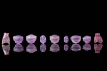 COLLECTION OF EGYPTIAN AMETHYST AMULETS