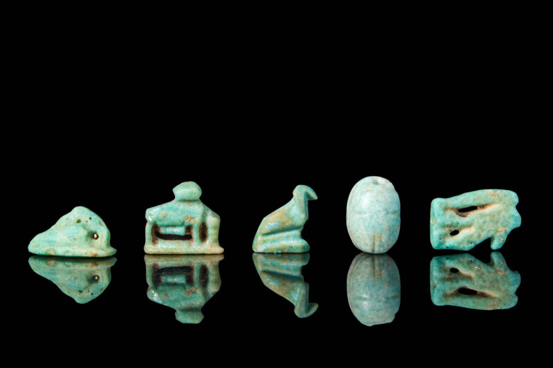 SET OF EGYPTIAN FAIENCE AMULETS

Late Period, Ca. 664 - 30 BC. A set of five g...