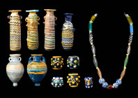 LARGE COLLECTION OF PHOENICIAN AND HELLENISTIC ALABASTROI, POINTED ARYBALLOI AND BEADS