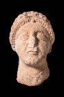 CYPRIOT STONE HEAD OF A GOD