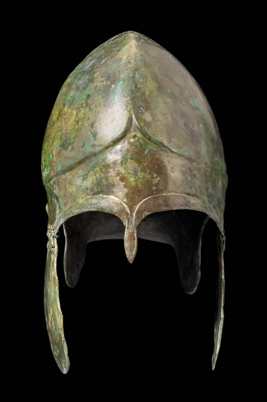 CHALCIDIAN BRONZE HELMET WITH CHEEK GUARDS

Ca. 500 BC. A striking Chalcidian ...
