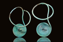 PAIR OF MATCHING CELTIC BRONZE BROOCHES WITH SPIRALS