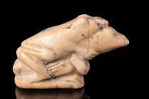 MESOPOTAMIAN WHITE STONE AMULET DEPICTING TWO FROGS